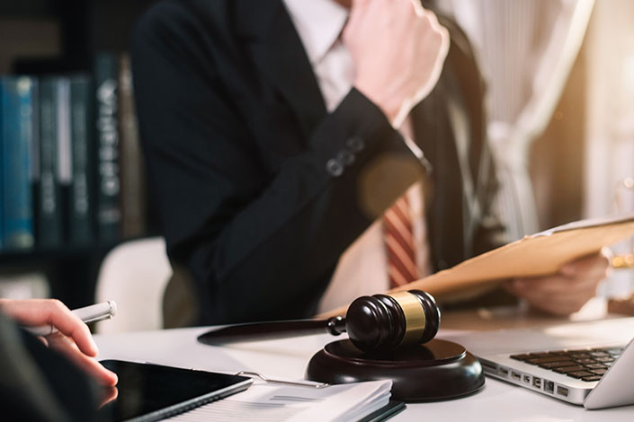 Trucking accident lawyers review a case.